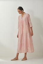 Pink silk Chanderi easy fit dress with all-over off white silk thread embroidery, highlighted with beads and sequins work.
