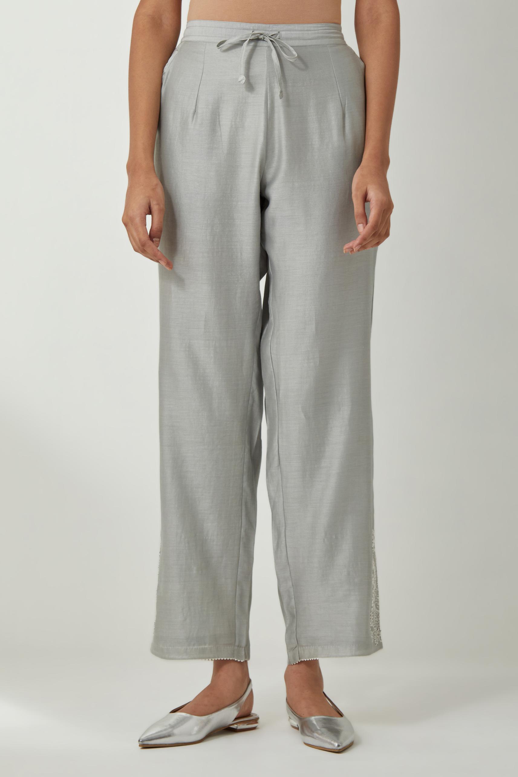 Bluish Grey silk Chanderi straight pants with embroidered boota at sides, highlighted with sequins and beads.