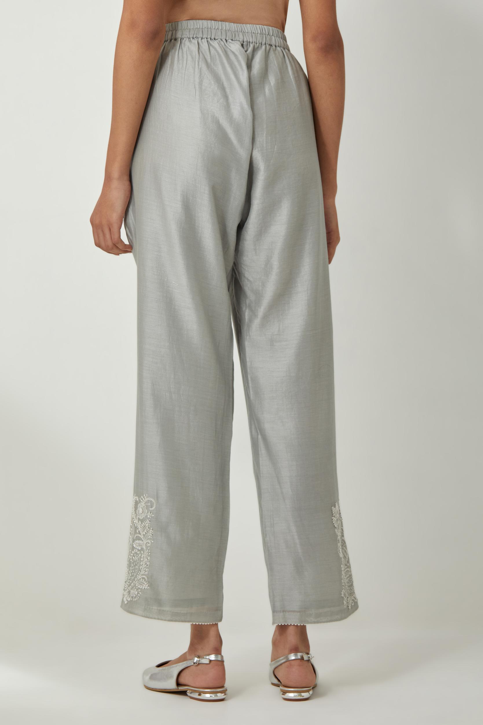 Bluish Grey silk Chanderi straight pants with embroidered boota at sides, highlighted with sequins and beads.