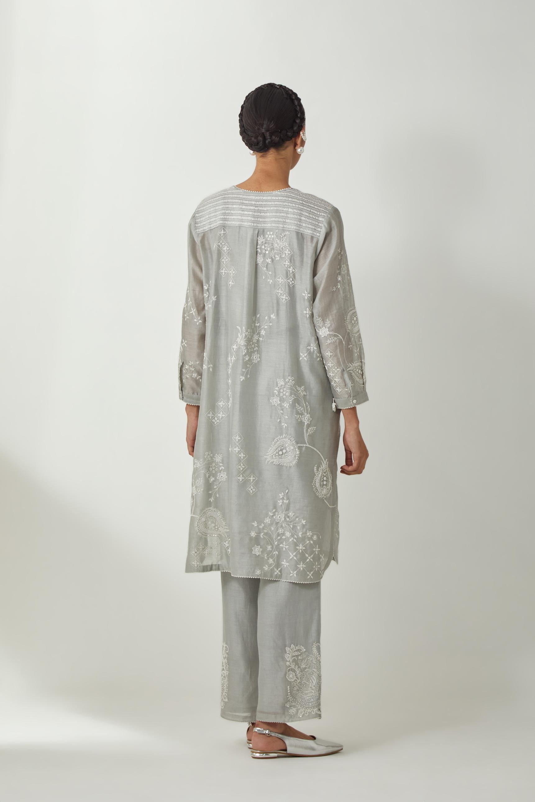 Bluish Grey silk Chandri straight short kurta with all-over off white silk thread embroidery, highlighted with beads and sequins work,  paired with Bluish Grey silk Chanderi straight pants with embroidered boota at sides, highlighted with sequins and bead