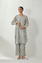 Bluish Grey silk Chandri straight short kurta with all-over off white silk thread embroidery, highlighted with beads and sequins work,  paired with Bluish Grey silk Chanderi straight pants with embroidered boota at sides, highlighted with sequins and bead