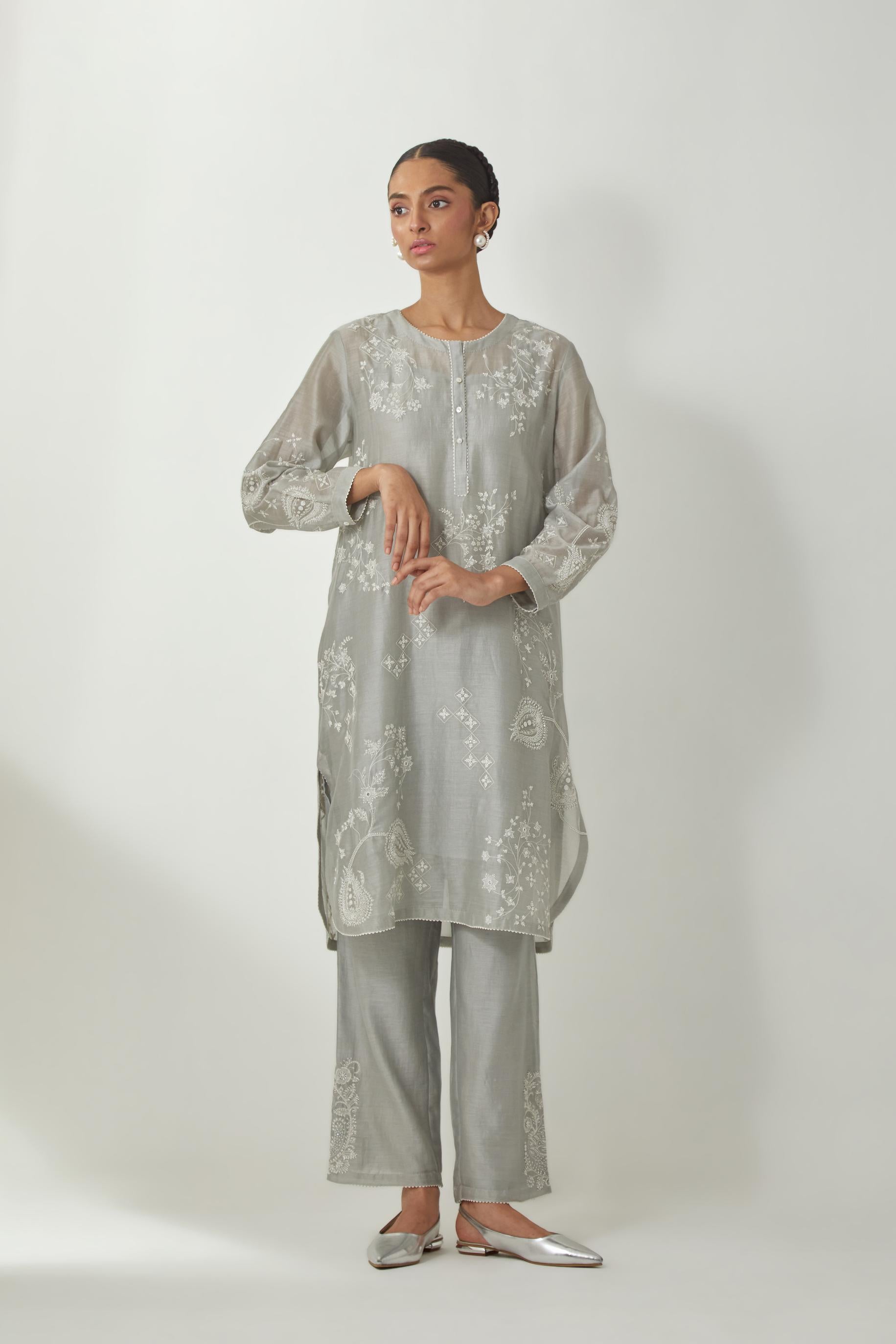 Bluish Grey silk Chandri straight short kurta with all-over off white silk thread embroidery, highlighted with beads and sequins work,  paired with Bluish Grey silk Chanderi straight pants with embroidered boota at sides, highlighted with sequins and bead