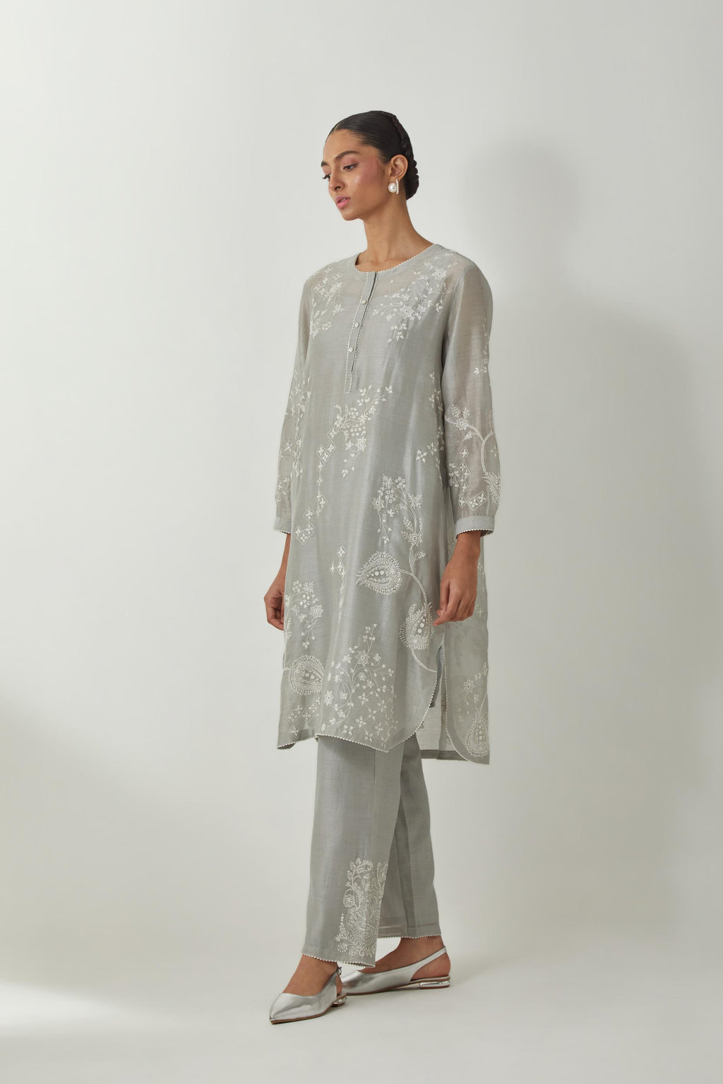 Bluish Grey silk Chandri straight short kurta with all-over off white silk thread embroidery, highlighted with beads and sequins work,  paired with Bluish Grey silk Chanderi straight pants with embroidered boota at sides, highlighted with sequins and bead