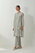 Bluish Grey silk Chandri straight short kurta with all-over off white silk thread embroidery, highlighted with beads and sequins work,  paired with Bluish Grey silk Chanderi straight pants with embroidered boota at sides, highlighted with sequins and bead