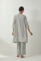 Bluish Grey silk Chanderi short kalidar kurta set with all-over off white silk thread embroidery, highlighted with beads and sequins work.