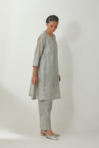Bluish Grey silk Chanderi short kalidar kurta set with all-over off white silk thread embroidery, highlighted with beads and sequins work.