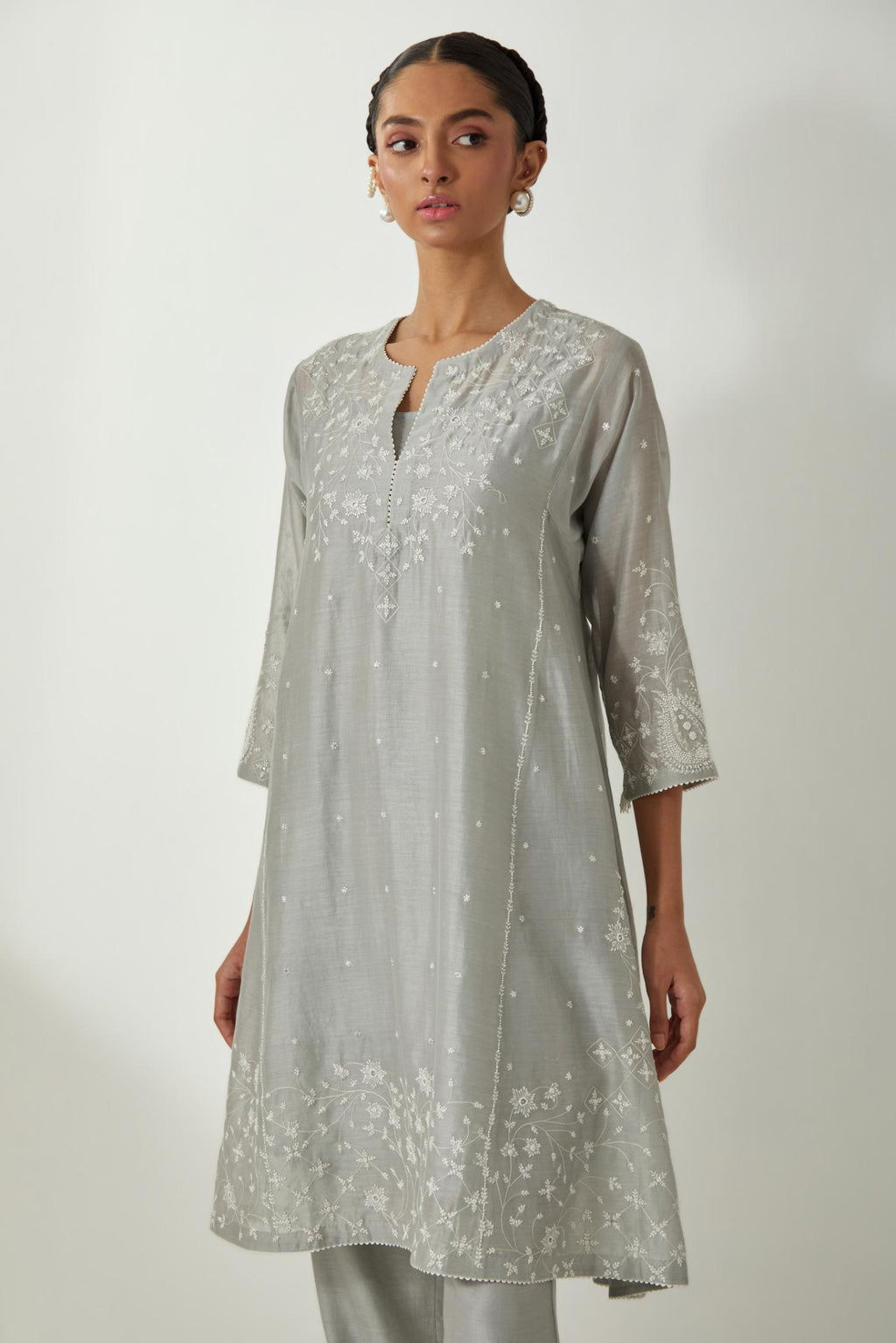 Bluish Grey silk Chanderi short kalidar kurta set with all-over off white silk thread embroidery, highlighted with beads and sequins work.