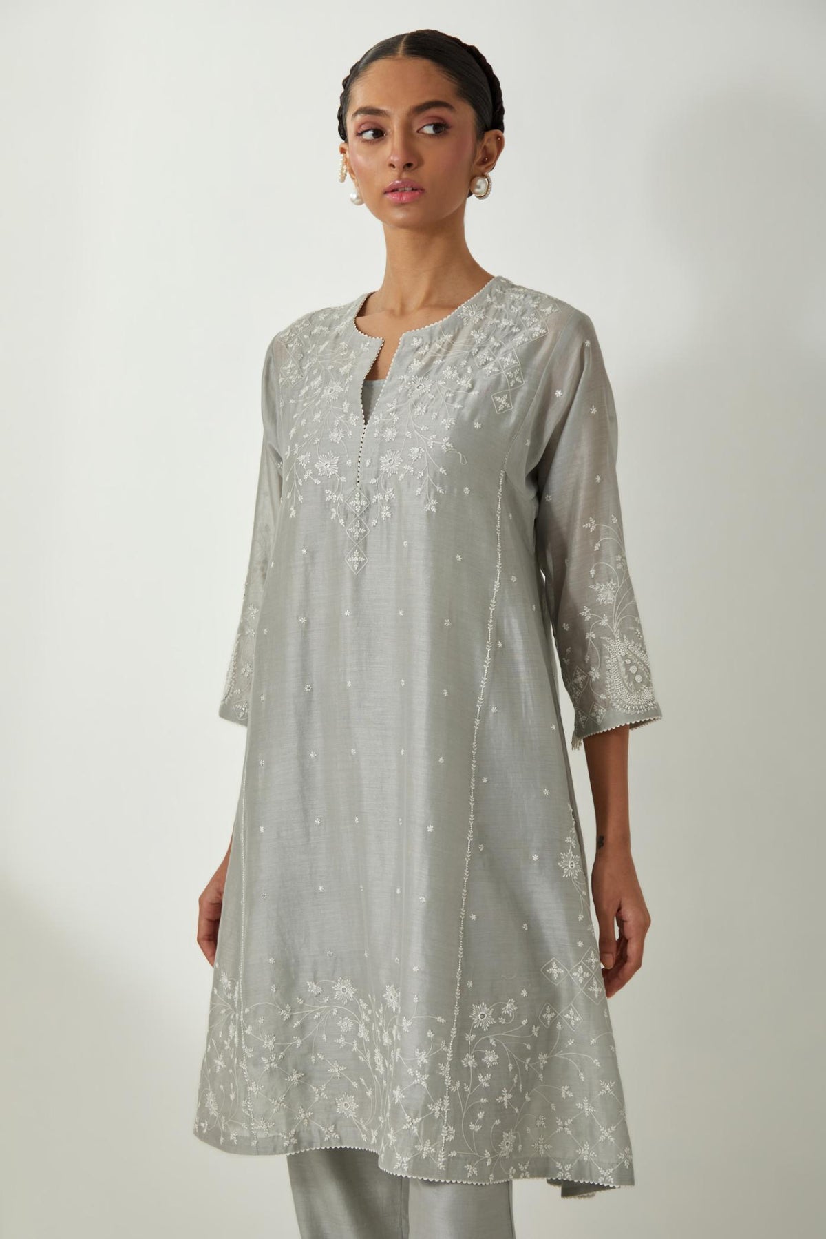 Bluish Grey silk Chanderi short kalidar kurta set with all-over off white silk thread embroidery, highlighted with beads and sequins work.
