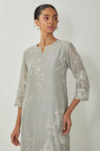 Bluish Grey silk Chanderi straight kurta set with all-over off white silk thread embroidery, highlighted with beads and sequins work.