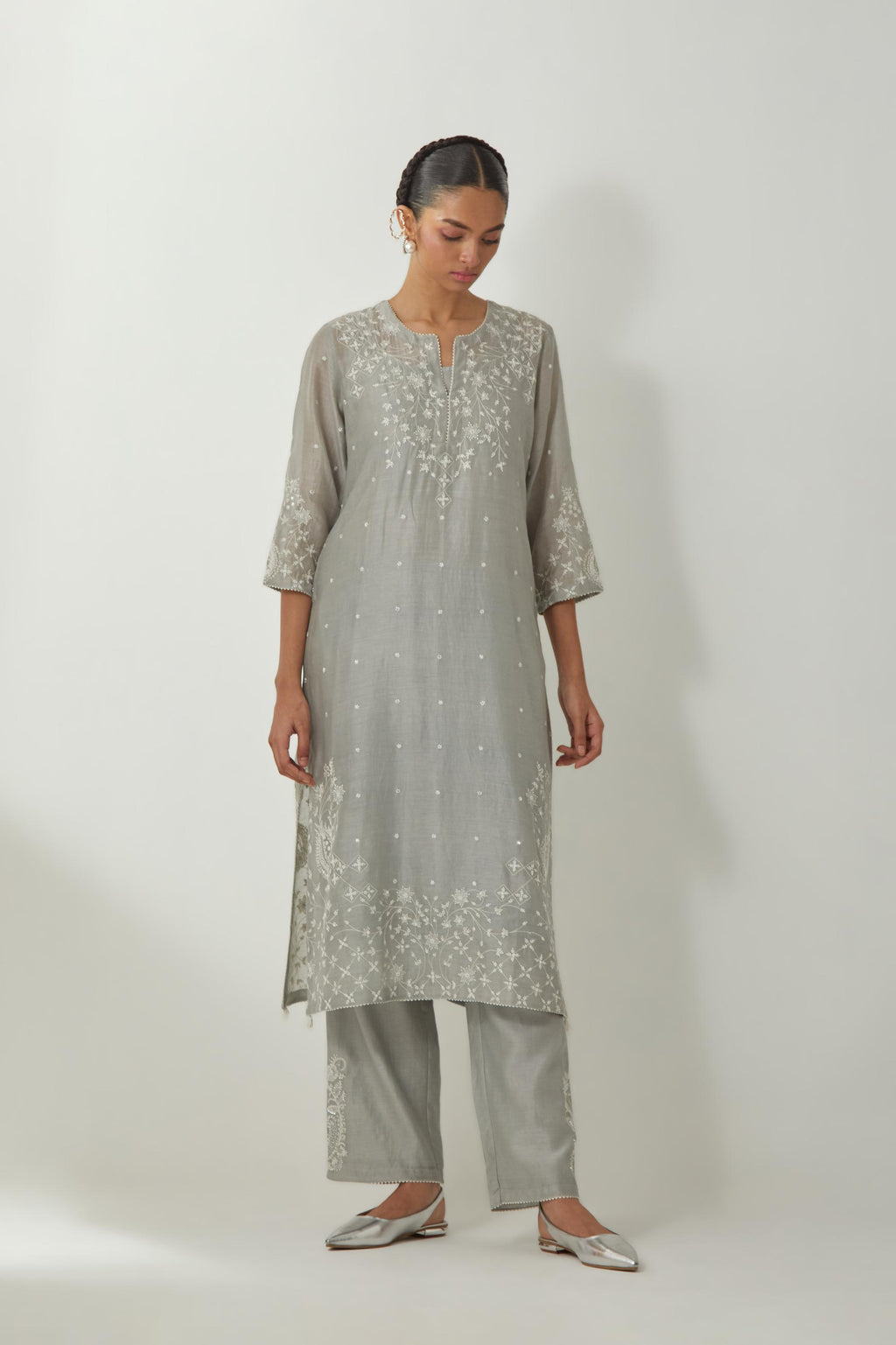 Bluish Grey silk Chanderi straight mid length kurta set with all-over off white silk thread embroidery, highlighted with beads, and sequins work at neck & hem.