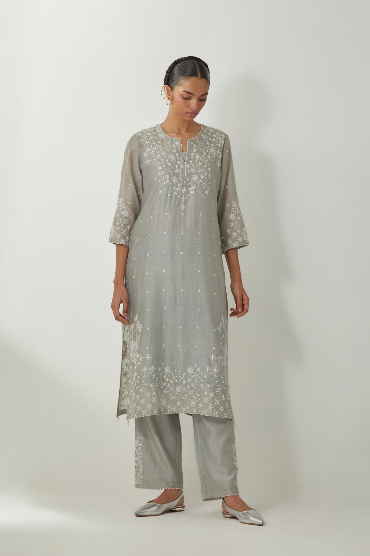 Bluish Grey silk Chanderi straight mid length kurta set with all-over off white silk thread embroidery, highlighted with beads, and sequins work at neck & hem.