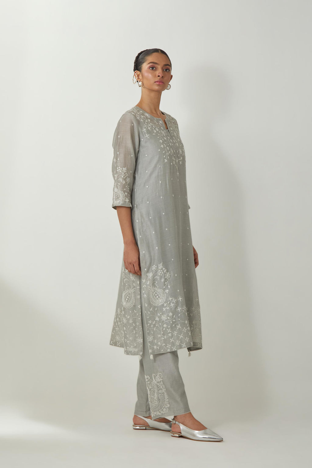 Bluish Grey silk Chanderi straight mid length kurta set with all-over off white silk thread embroidery, highlighted with beads, and sequins work at neck & hem.