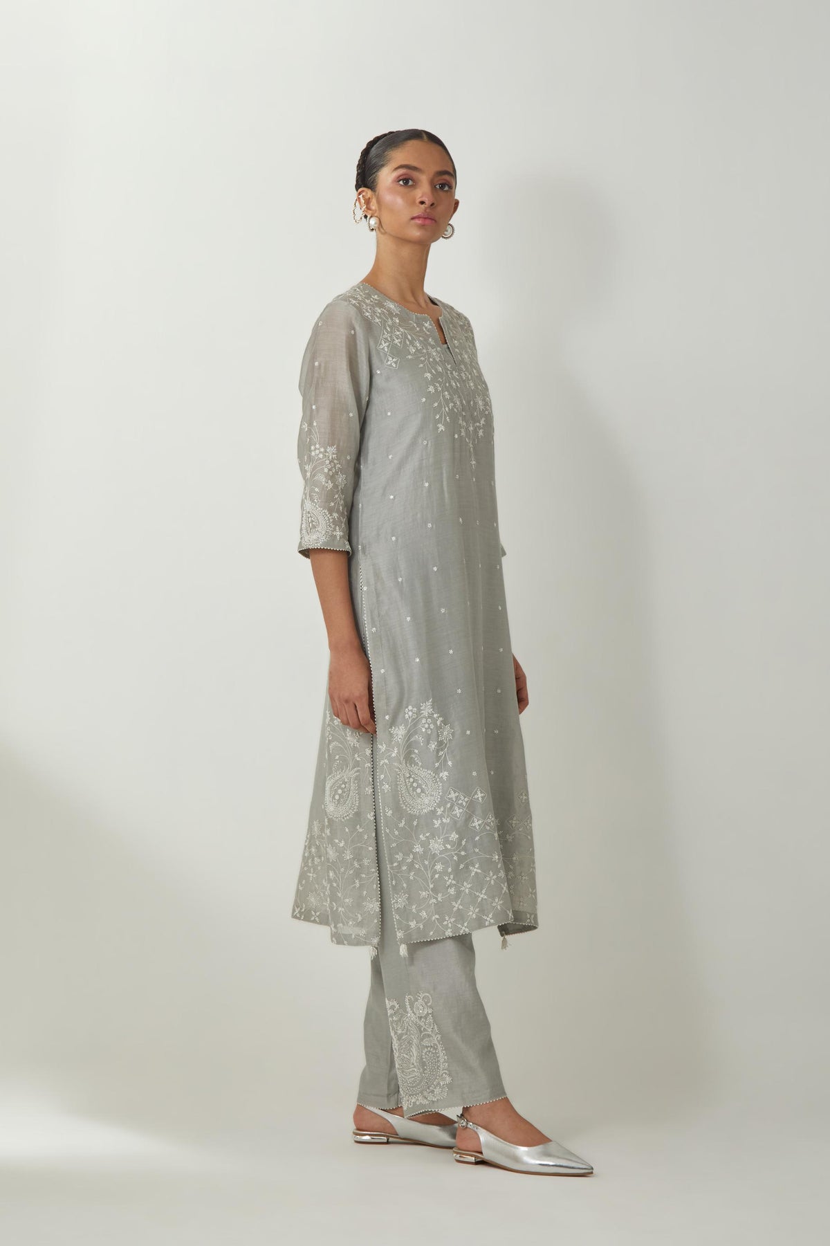 Bluish Grey silk Chanderi straight mid length kurta set with all-over off white silk thread embroidery, highlighted with beads, and sequins work at neck & hem.