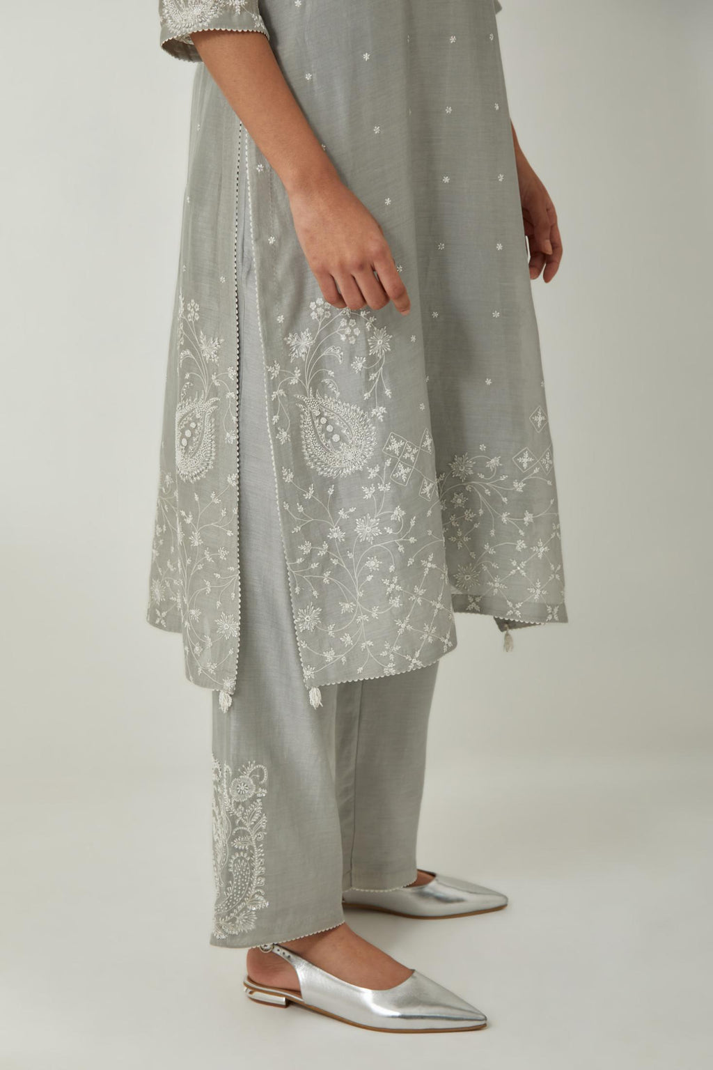 Bluish Grey silk Chanderi straight mid length kurta set with all-over off white silk thread embroidery, highlighted with beads, and sequins work at neck & hem.