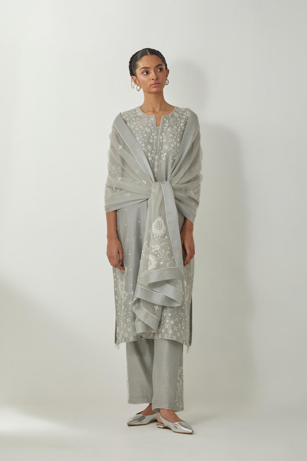 Bluish Grey silk Chanderi straight mid length kurta set with all-over off white silk thread embroidery, highlighted with beads, and sequins work at neck & hem.