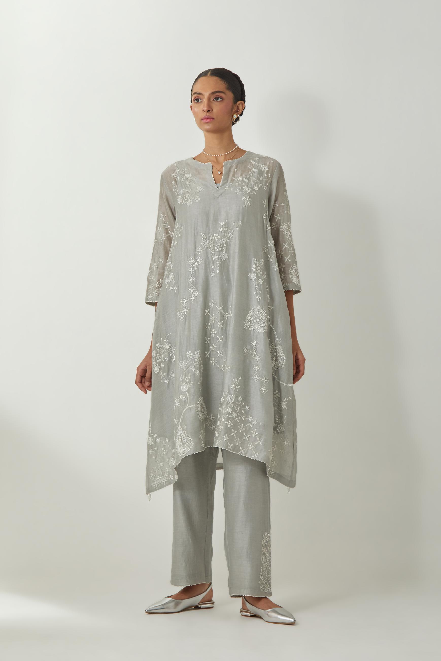 Bluish Grey silk Chanderi short easy fit kurta set with straight hem and all-over off white silk thread embroidery, highlighted with beads and sequins work.