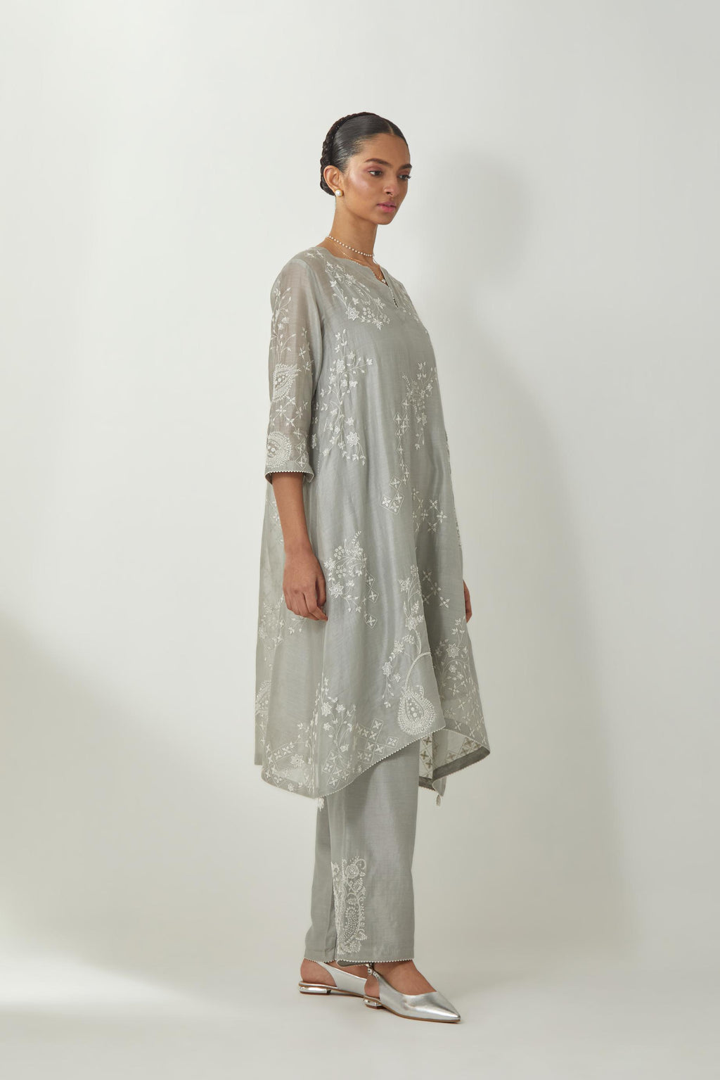 Bluish Grey silk Chanderi short easy fit kurta set with straight hem and all-over off white silk thread embroidery, highlighted with beads and sequins work.