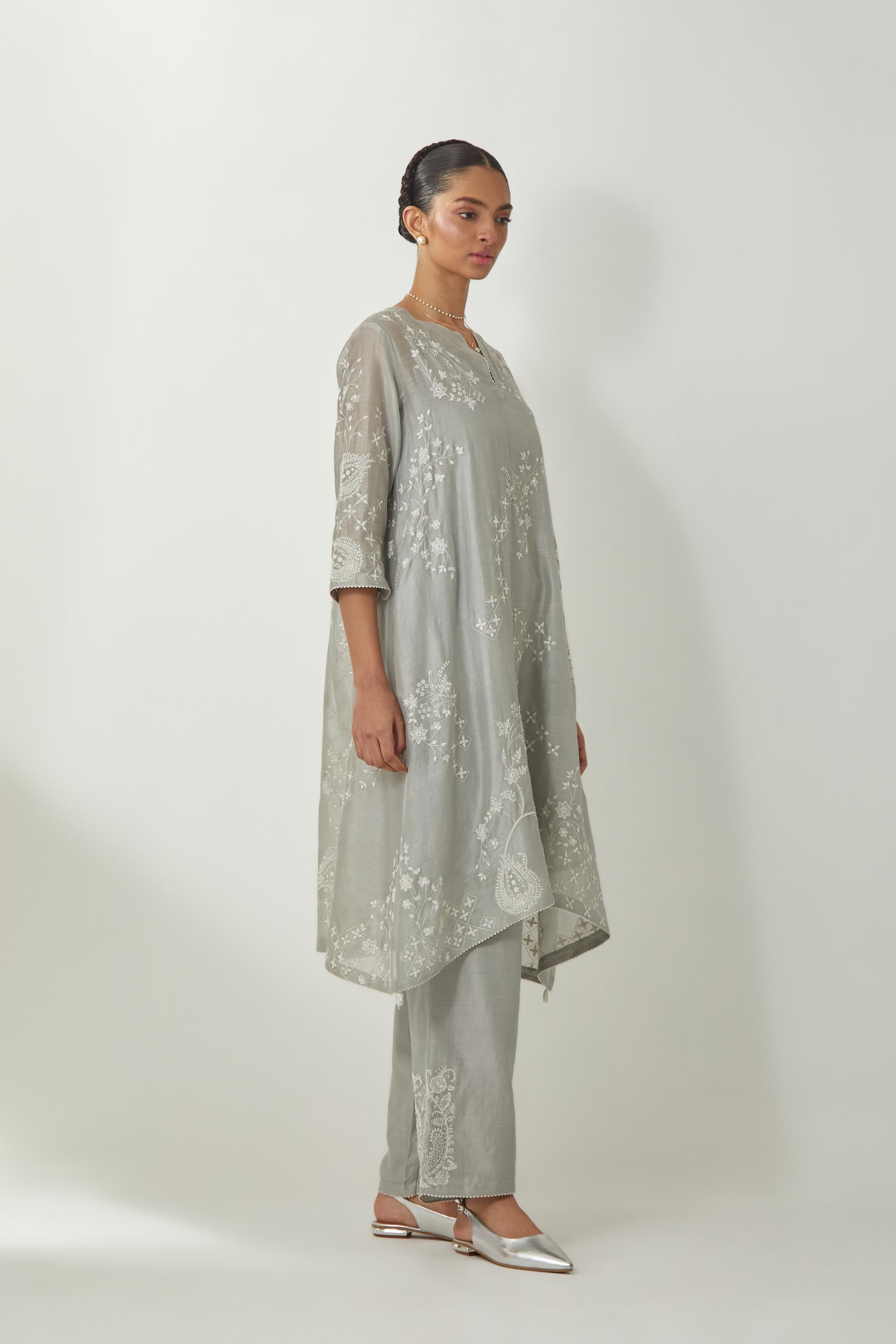 Bluish Grey silk Chanderi short easy fit kurta set with straight hem and all-over off white silk thread embroidery, highlighted with beads and sequins work.