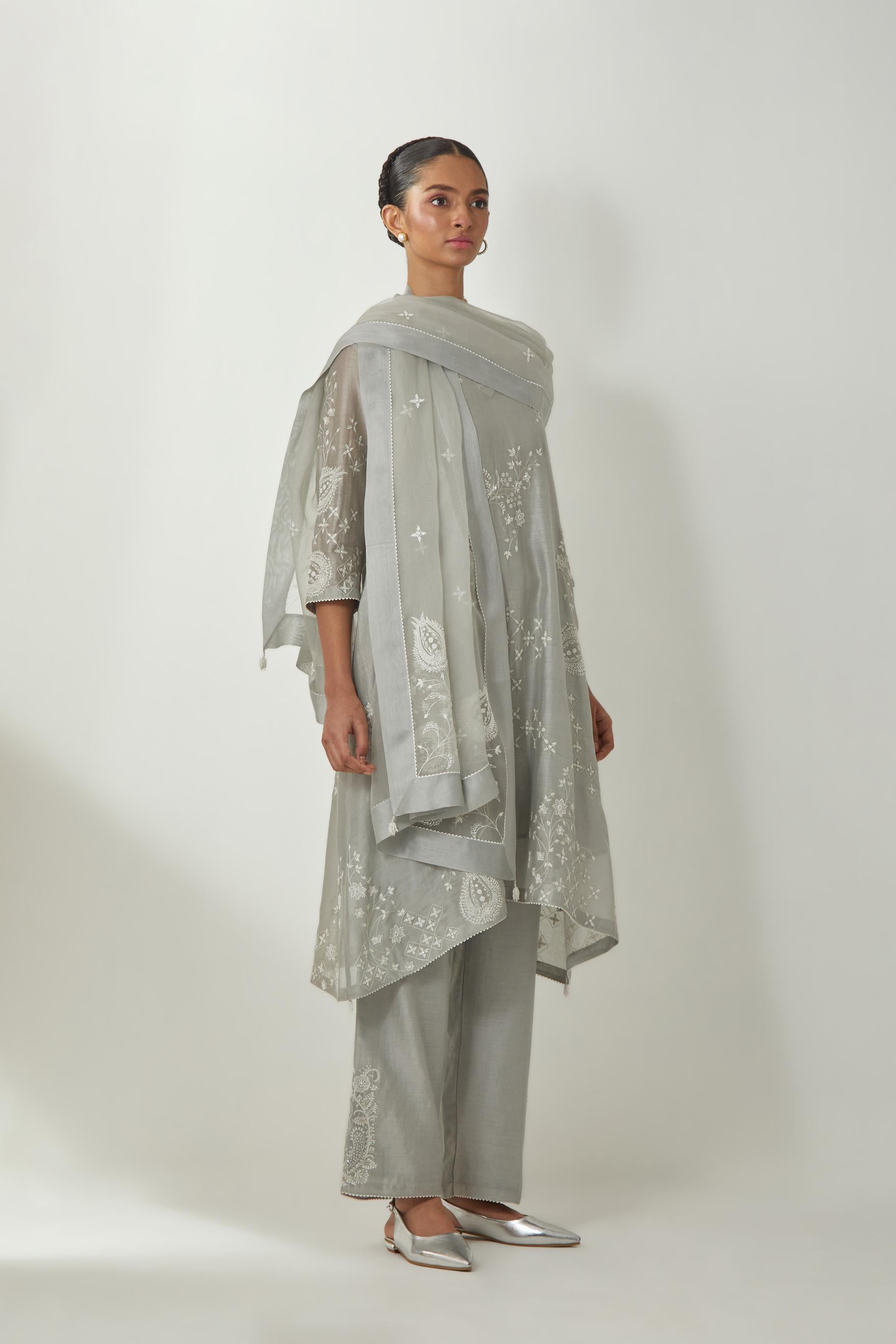 Bluish Grey silk Chanderi short easy fit kurta set with straight hem and all-over off white silk thread embroidery, highlighted with beads and sequins work.
