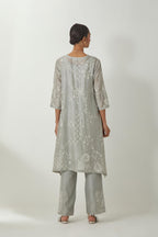 Bluish Grey silk Chanderi short easy fit kurta set with straight hem and all-over off white silk thread embroidery, highlighted with beads and sequins work.