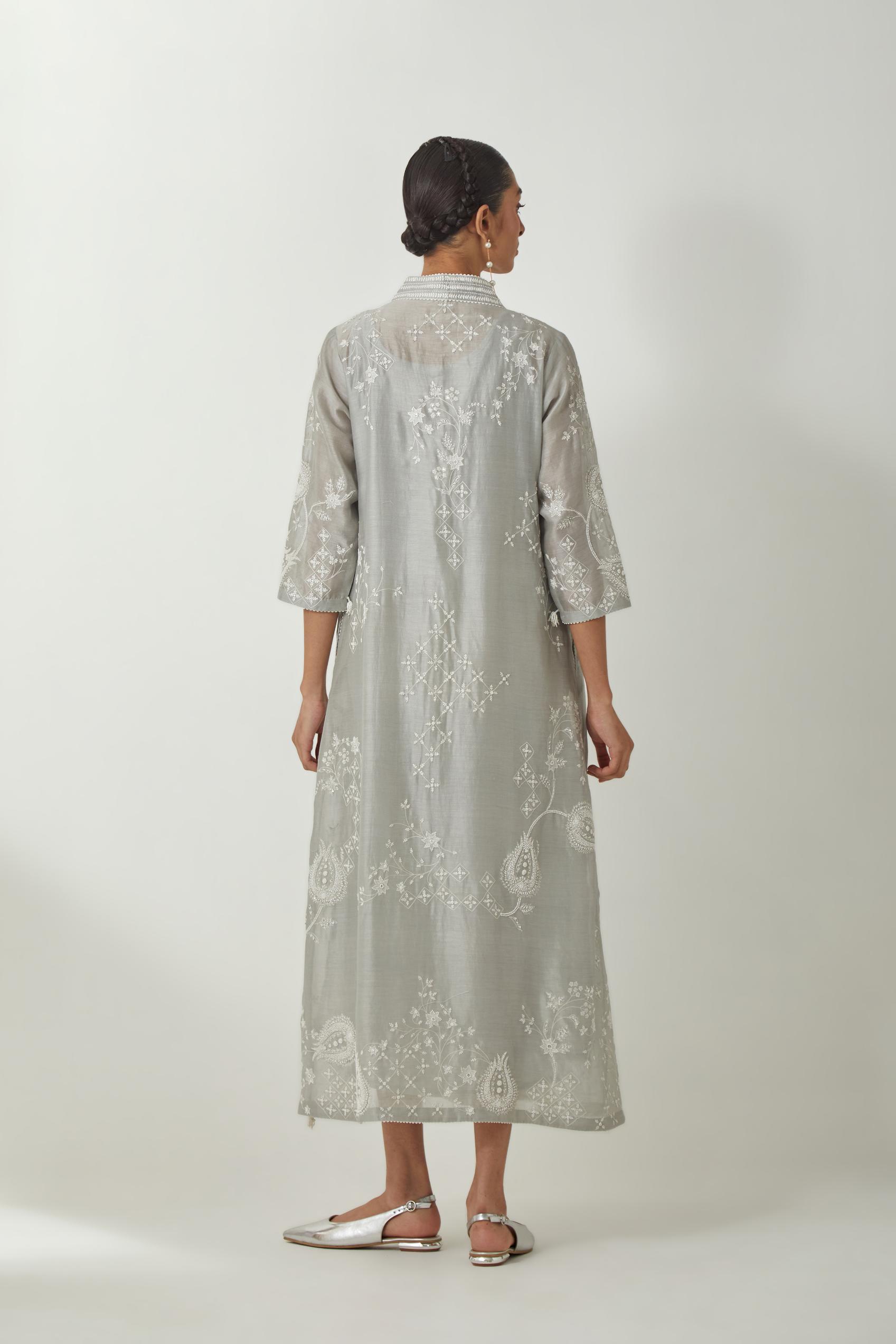 Bluish Grey silk Chanderi easy fit dress with all-over off white silk thread embroidery, highlighted with beads and sequins work.