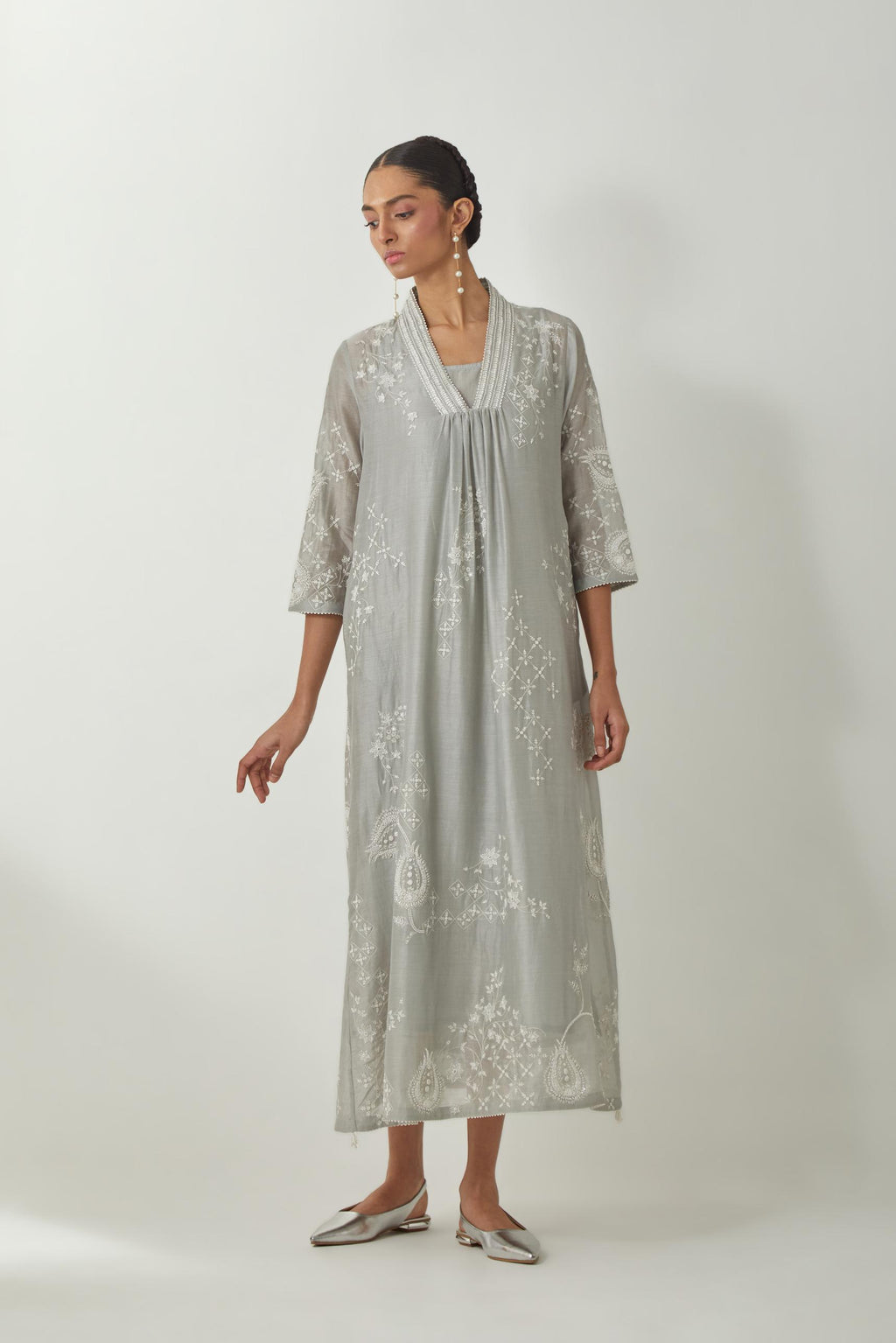 Bluish Grey silk Chanderi easy fit dress with all-over off white silk thread embroidery, highlighted with beads and sequins work.