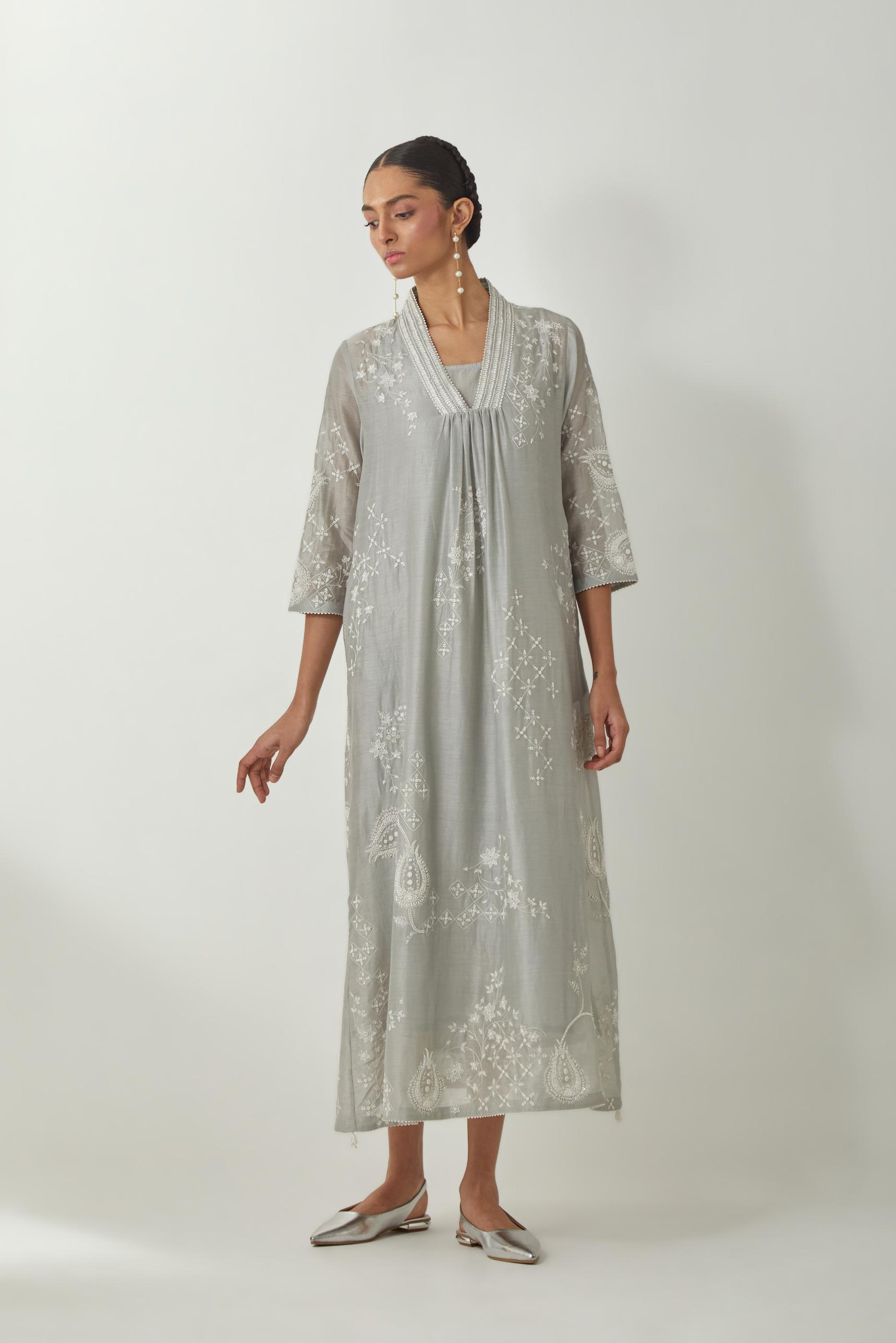 Bluish Grey silk Chanderi easy fit dress with all-over off white silk thread embroidery, highlighted with beads and sequins work.