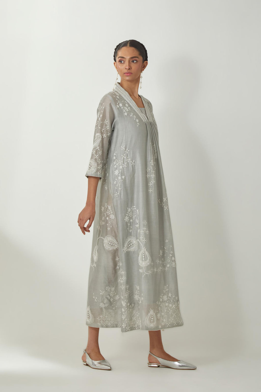 Bluish Grey silk Chanderi easy fit dress with all-over off white silk thread embroidery, highlighted with beads and sequins work.