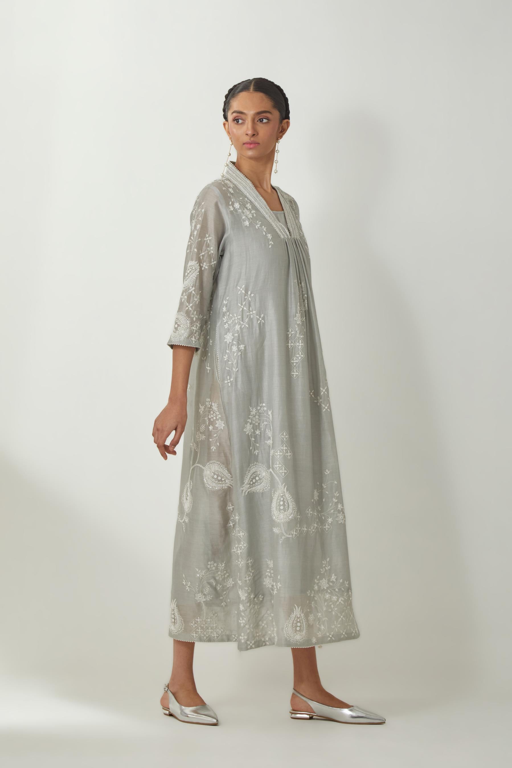 Bluish Grey silk Chanderi easy fit dress with all-over off white silk thread embroidery, highlighted with beads and sequins work.