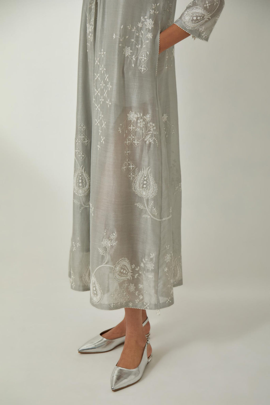 Bluish Grey silk Chanderi easy fit dress with all-over off white silk thread embroidery, highlighted with beads and sequins work.