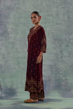 Deep maroonstraight Silk Velvet kurta set with all-over hand-embroidered bead, sequins and zari work.