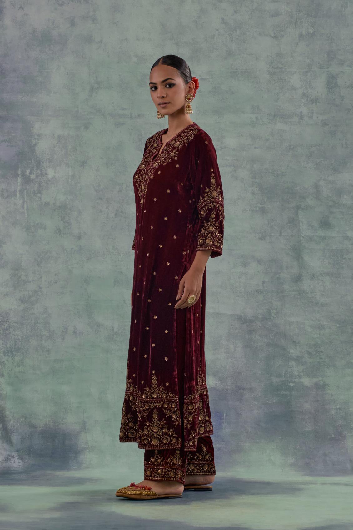 Deep maroonstraight Silk Velvet kurta set with all-over hand-embroidered bead, sequins and zari work.