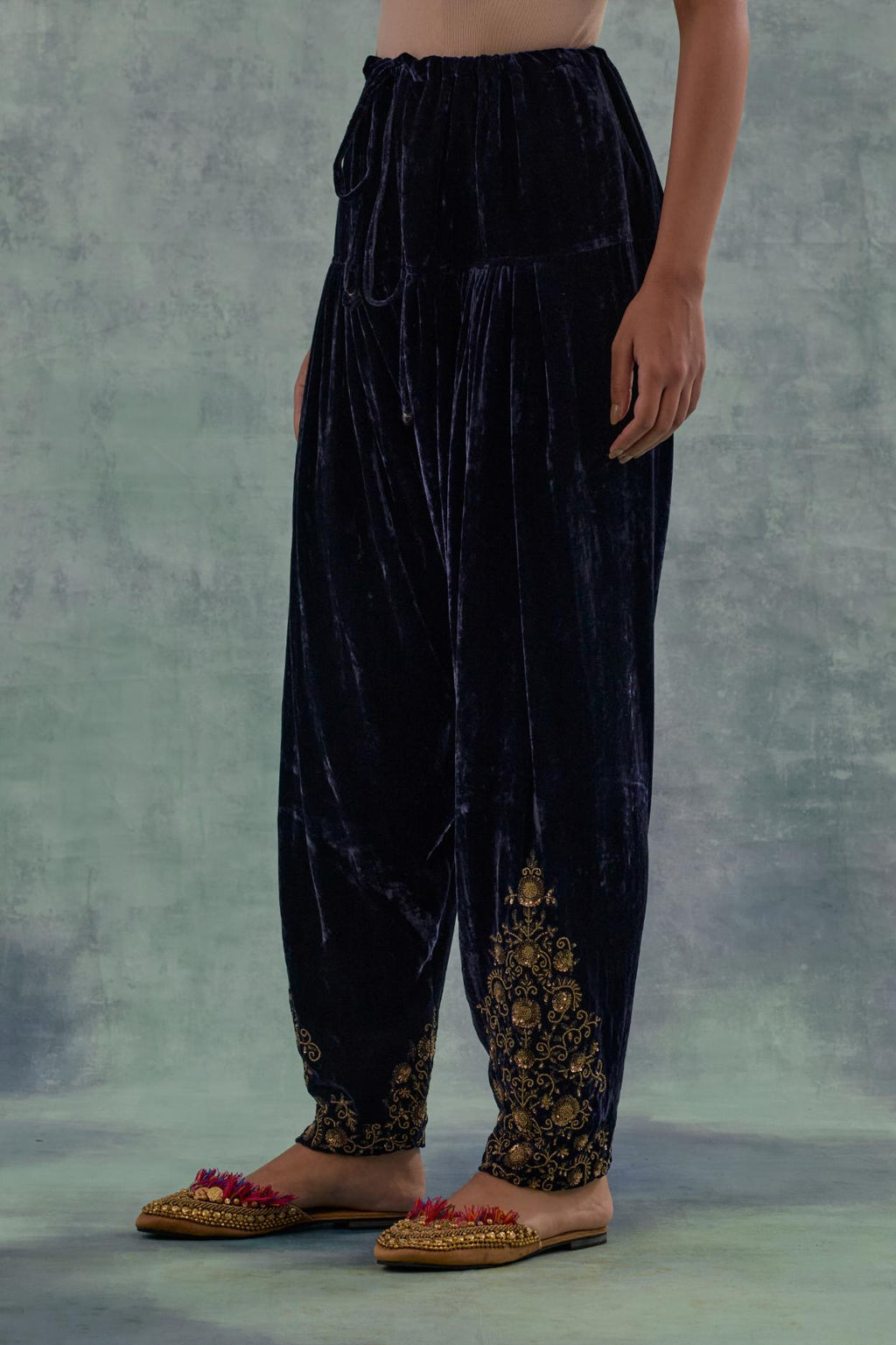Navy Silk velvet salwar, highlighted with hand embroidered bead, sequins and zari motifs.