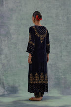 Navy straight long kurta Set in Silk Velvet with hand-embroidered bead, sequins and zari detailing on neck, sleeves and hem.