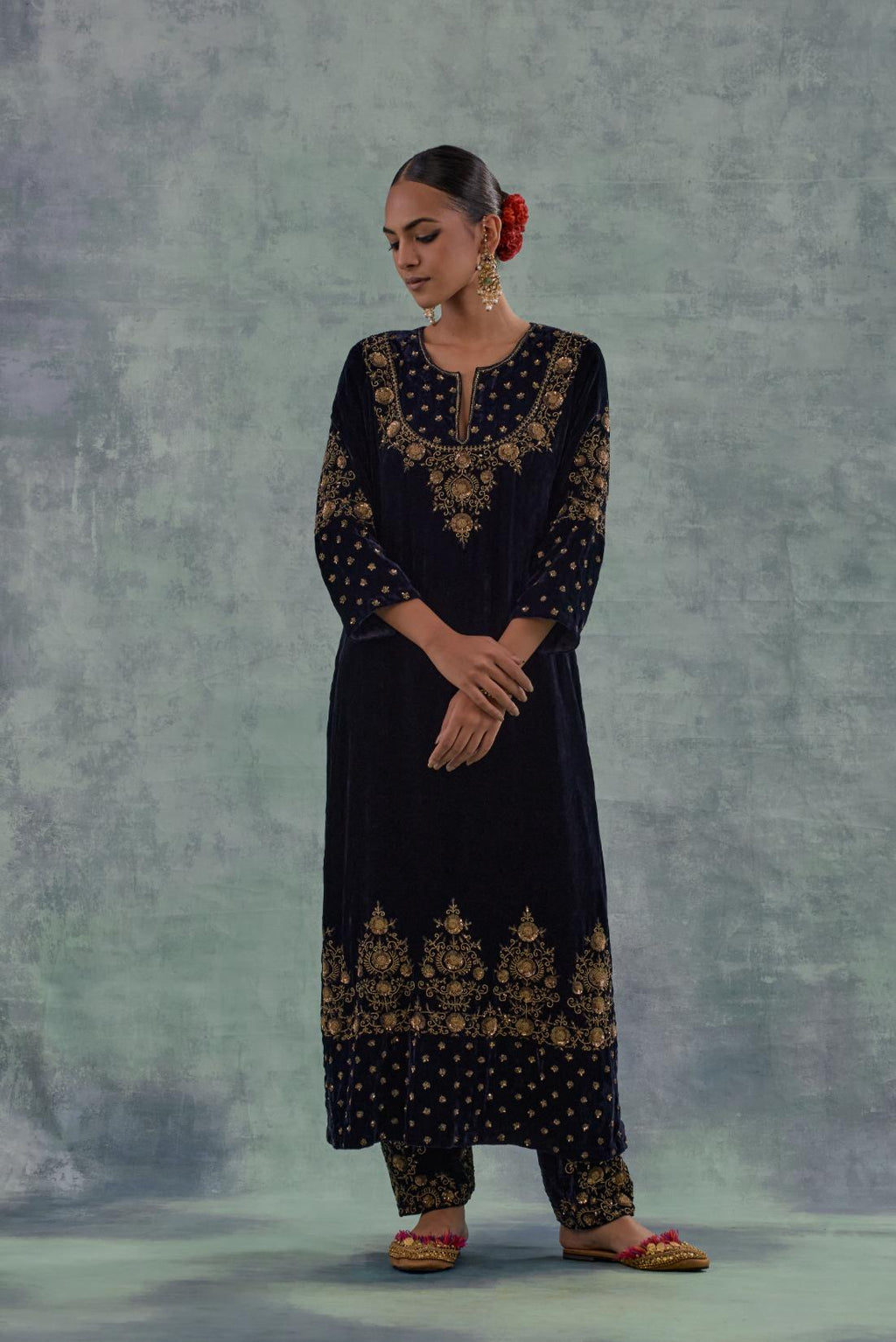 Navy straight long kurta Set in Silk Velvet with hand-embroidered bead, sequins and zari detailing on neck, sleeves and hem.