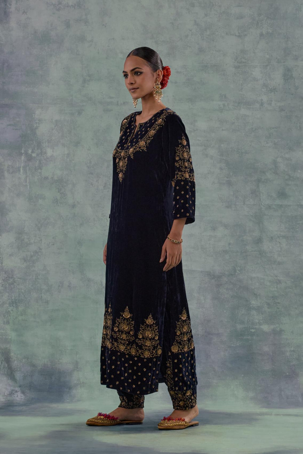 Navy straight long kurta Set in Silk Velvet with hand-embroidered bead, sequins and zari detailing on neck, sleeves and hem.