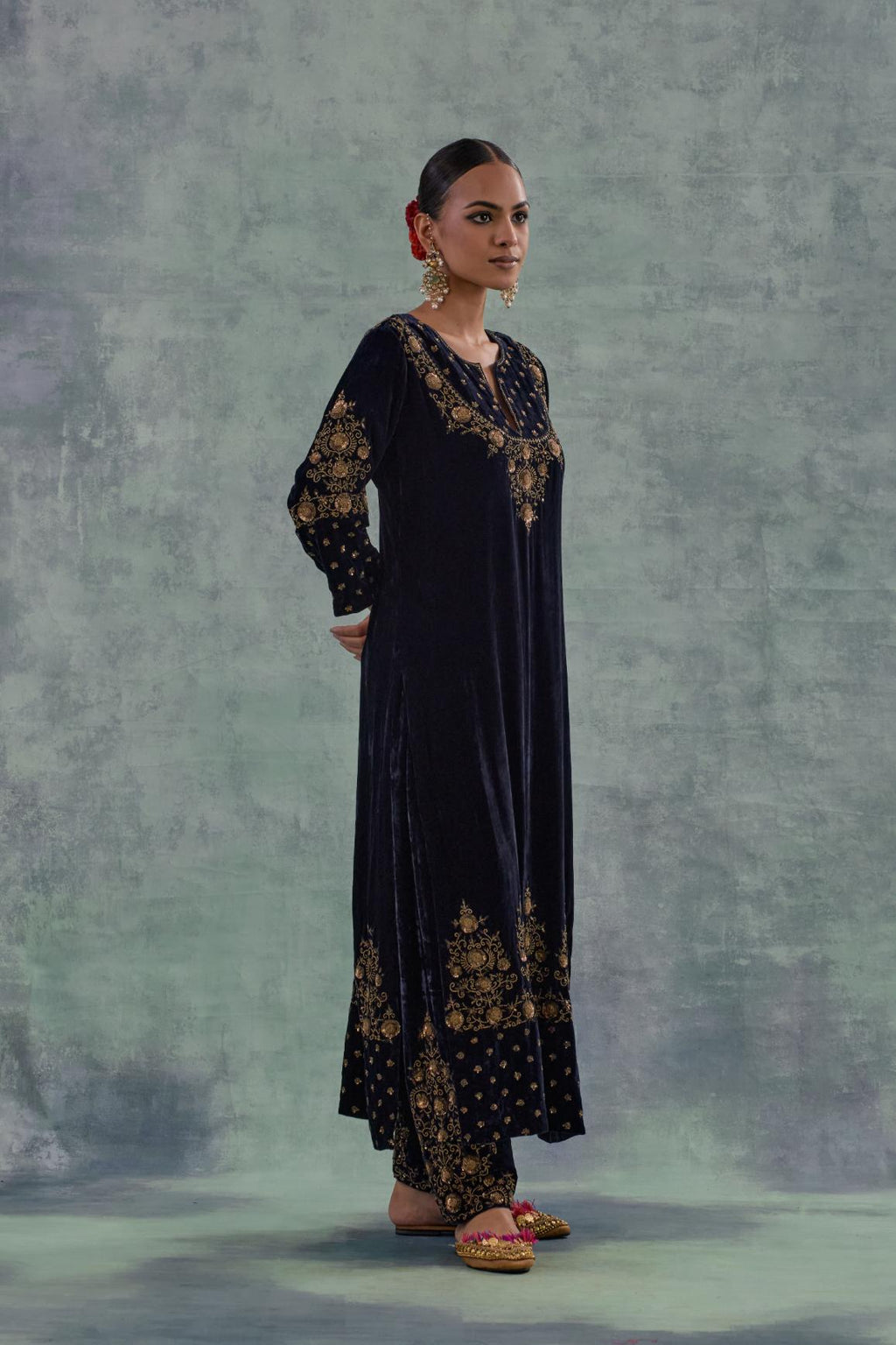 Navy straight long kurta Set in Silk Velvet with hand-embroidered bead, sequins and zari detailing on neck, sleeves and hem.