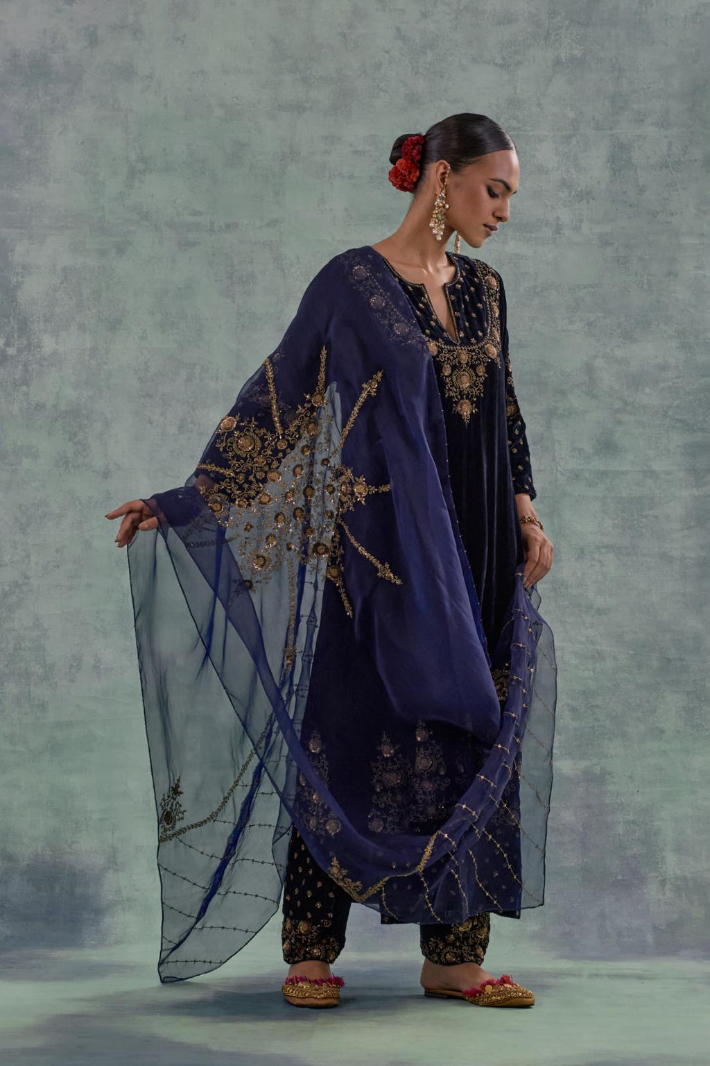 Navy straight long kurta Set in Silk Velvet with hand-embroidered bead, sequins and zari detailing on neck, sleeves and hem.