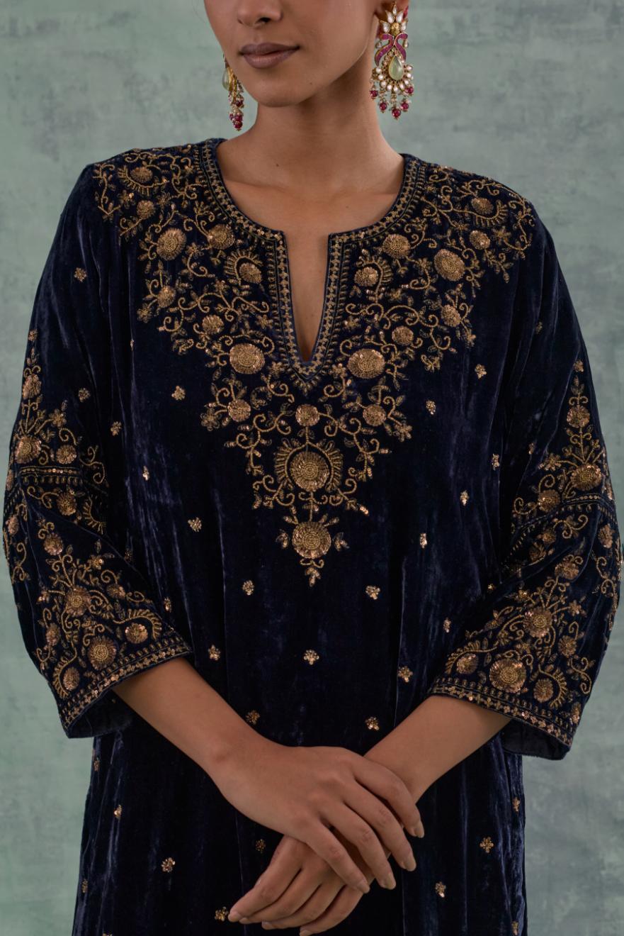 Navy straight Silk Velvet kurta set with all-over hand-embroidered bead, sequins and zari work.