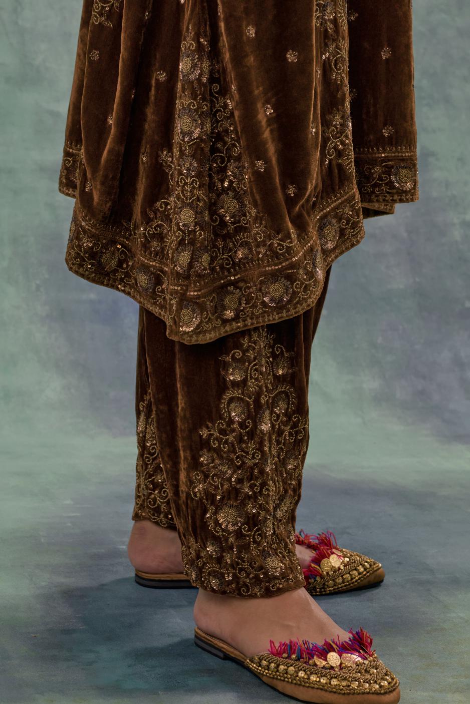 Russet easy fit A-line, panelled, short kurta in silk velvet with all-over hand embroidery at the neck, sleeves and hem.