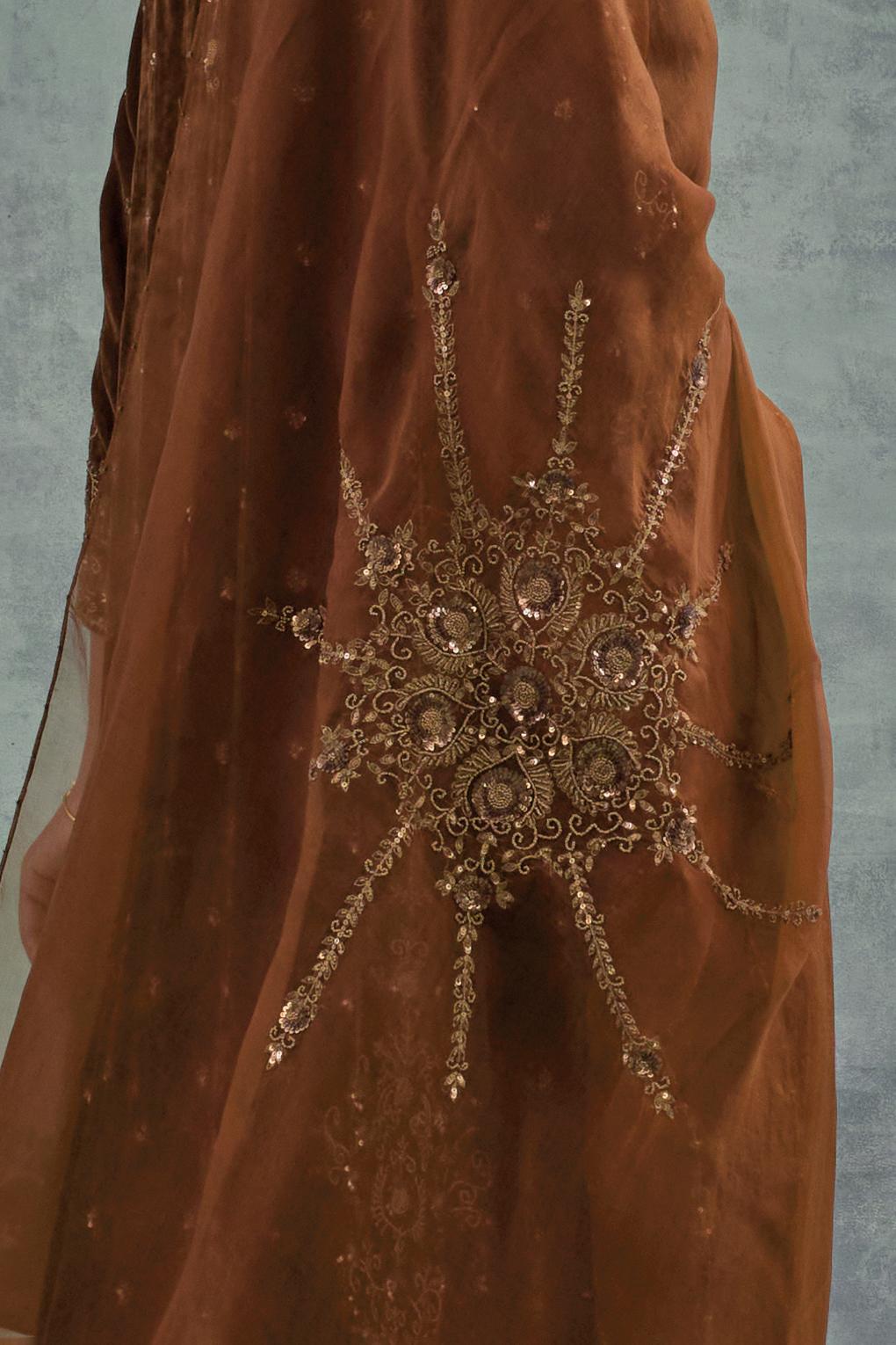 Russet straight Silk Velvet kurta set with all-over hand-embroidered bead, sequins and zari work.