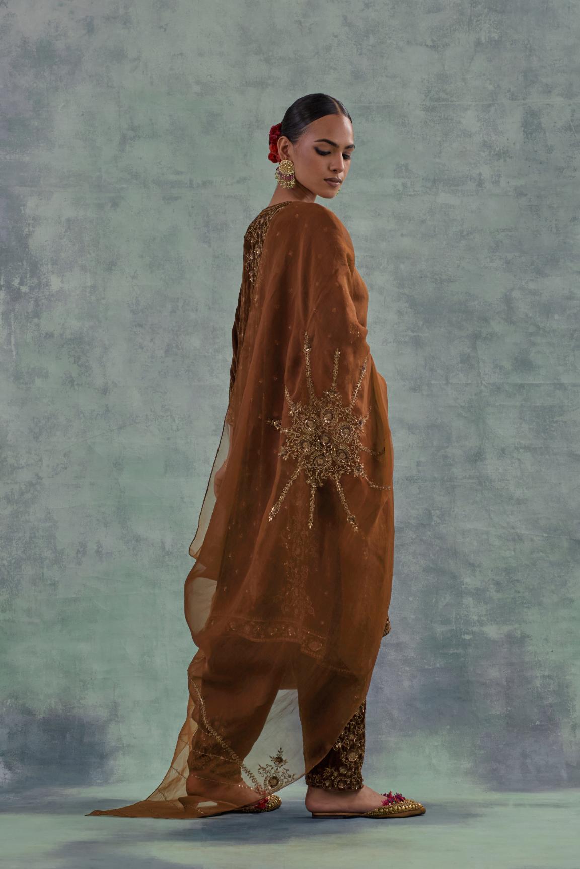 Russet straight Silk Velvet kurta set with all-over hand-embroidered bead, sequins and zari work.