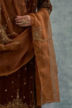 Russet straight Silk Velvet kurta set with all-over hand-embroidered bead, sequins and zari work.