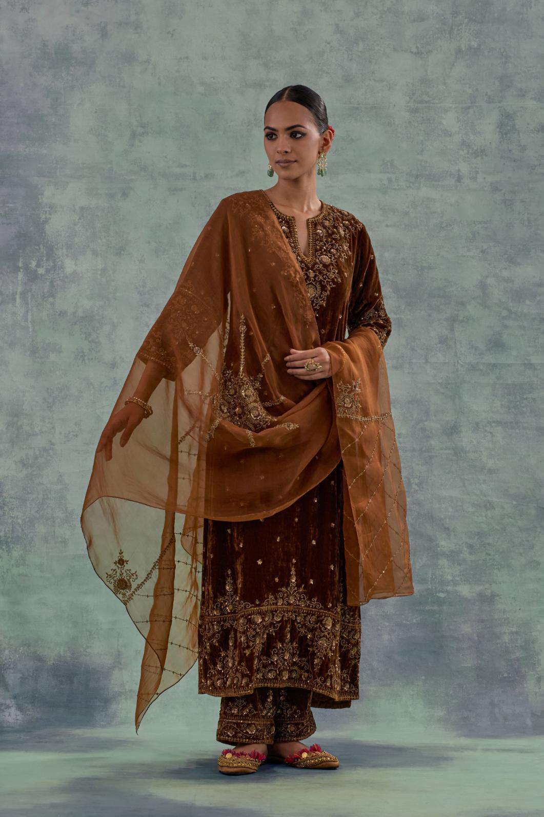 Russet straight Silk Velvet kurta set with all-over hand-embroidered bead, sequins and zari work.