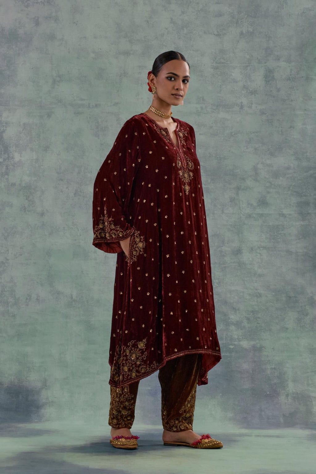 Deep maroon easy fit A-line short kurta set in silk velvet with all-over bead, sequins and zari hand embroidery.