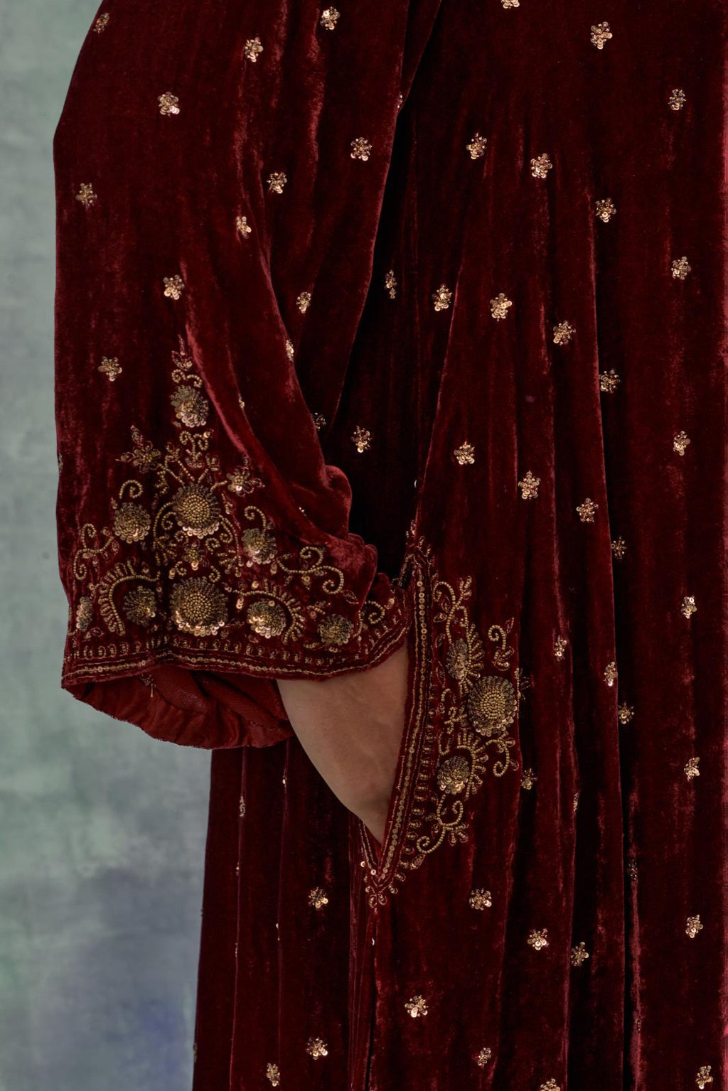 Deep maroon easy fit A-line short kurta set in silk velvet with all-over bead, sequins and zari hand embroidery.