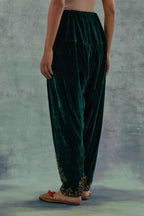 Emerald Green Silk velvet salwar, highlighted with hand embroidered bead, sequins and zari motifs.