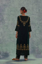 Emerald Green straight long kurta Set in Silk Velvet with hand-embroidered bead, sequins and zari detailing on neck, sleeves and hem.