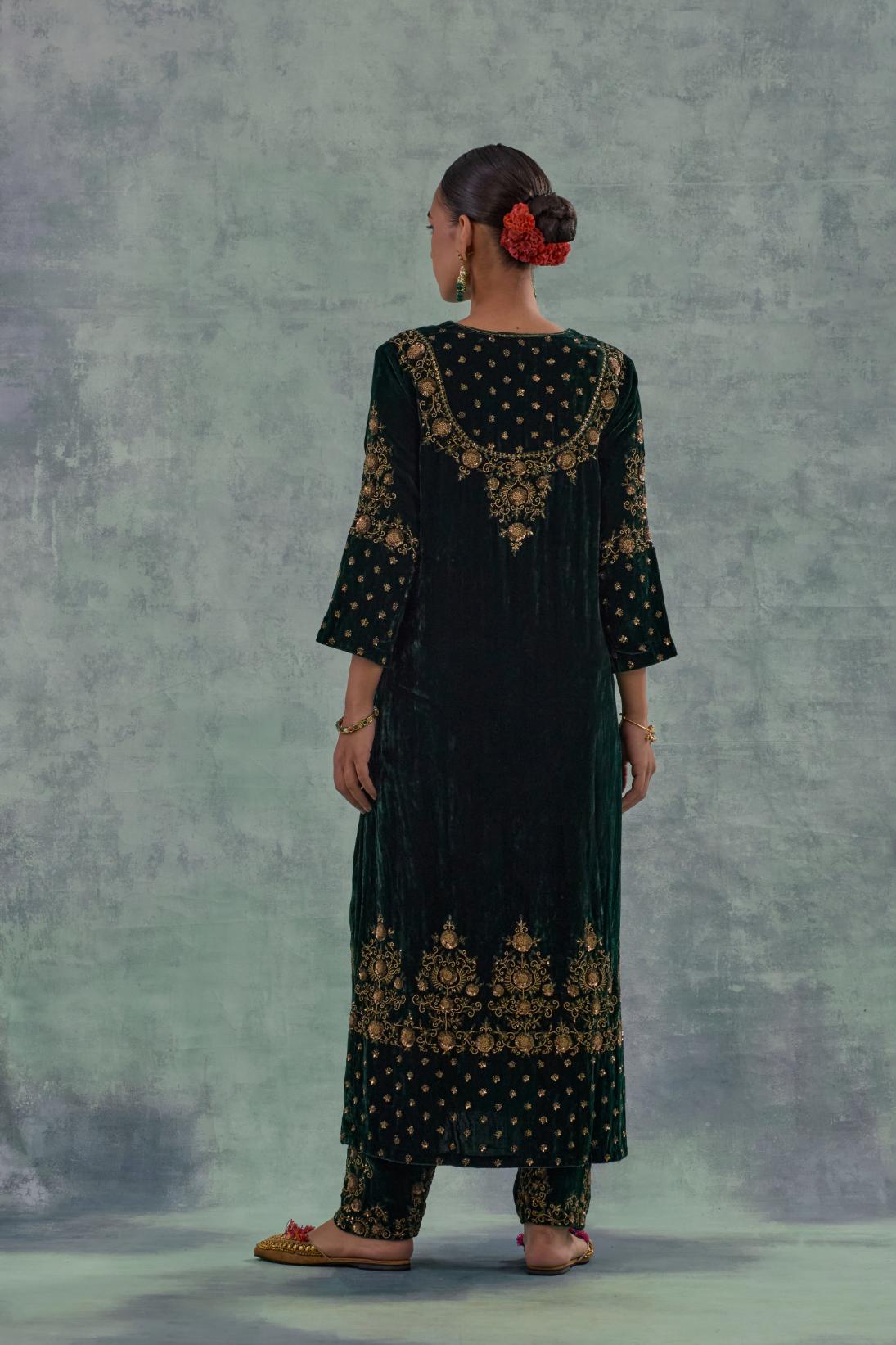 Emerald Green straight long kurta Set in Silk Velvet with hand-embroidered bead, sequins and zari detailing on neck, sleeves and hem.