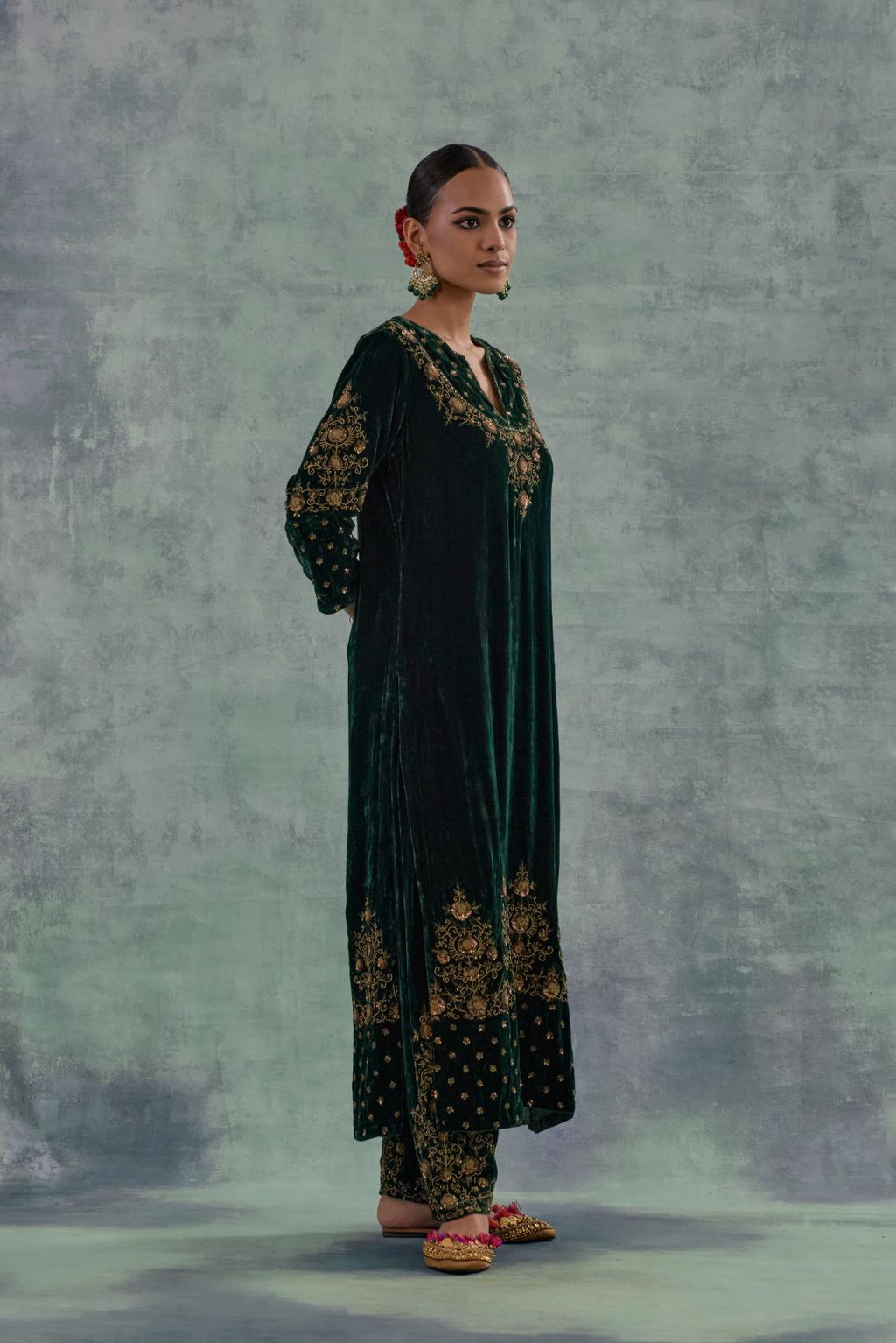 Emerald Green straight long kurta Set in Silk Velvet with hand-embroidered bead, sequins and zari detailing on neck, sleeves and hem.